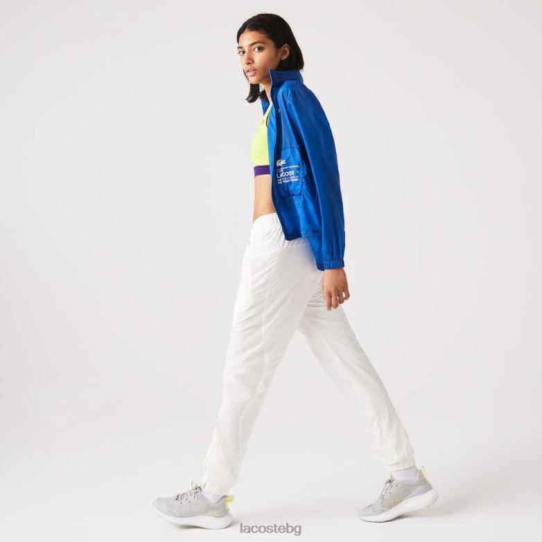 Жени Lacoste бяло панталони с морски принт облекло XTV622554