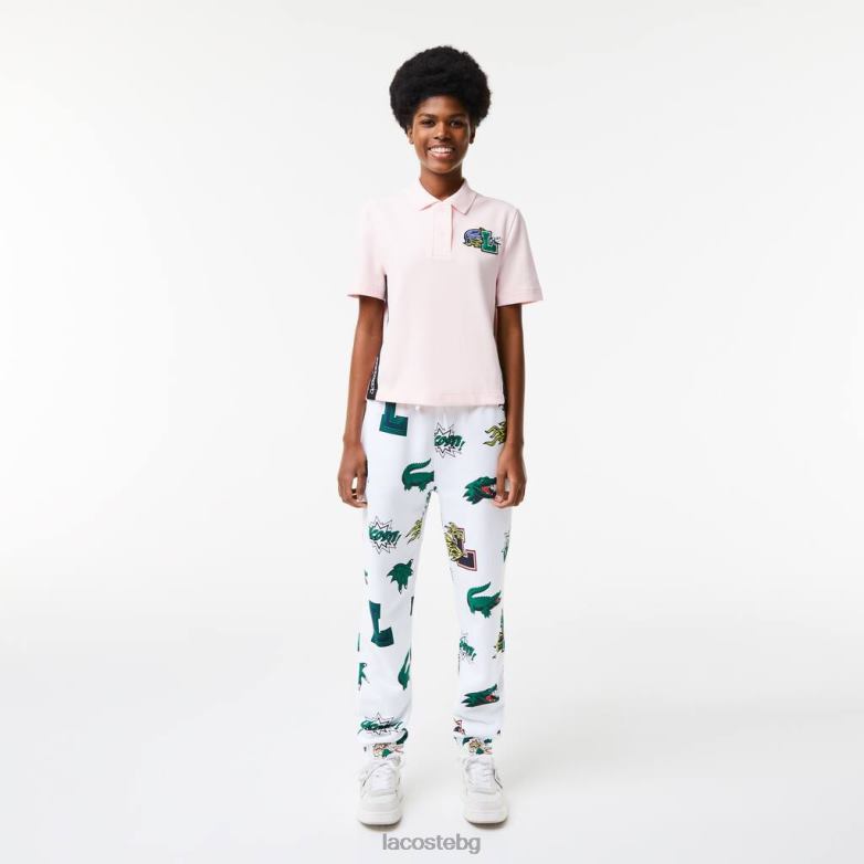 Жени Lacoste светло розово обикновена комична значка поло облекло XTV622494