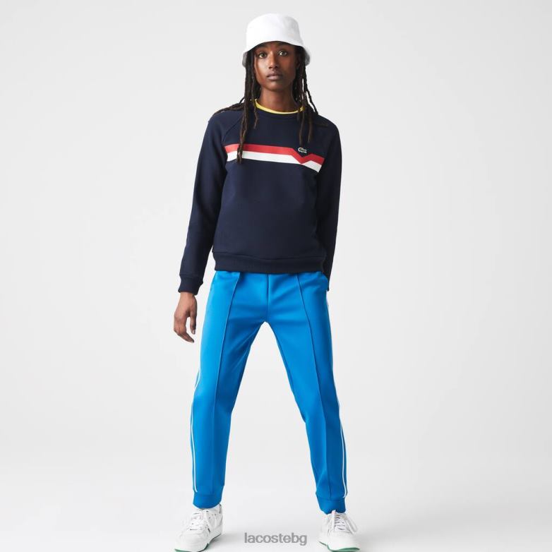 Жени Lacoste тъмносиньо/бяло/червено произведен във Франция пуловер от органичен памук с цветни блокове облекло XTV622607