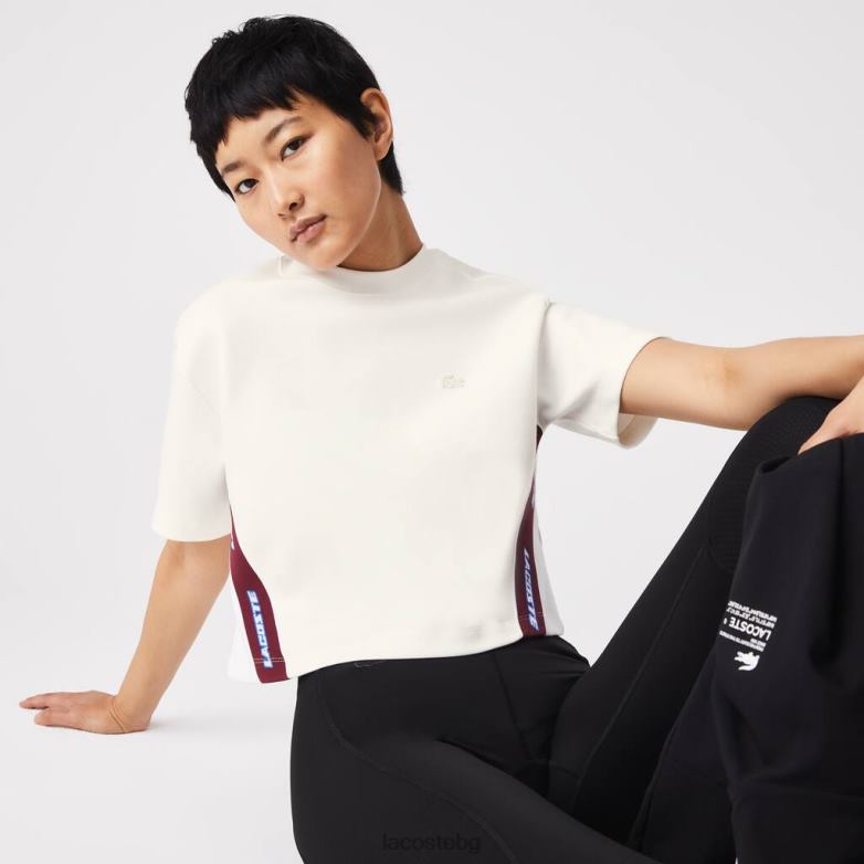 Жени Lacoste бяло свободна тениска с щамповани ленти облекло XTV622547