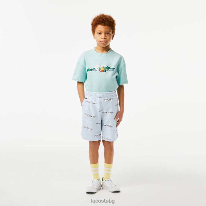 деца Lacoste светло синьо къси панталони от щампована органична памучна фланела облекло XTV623102