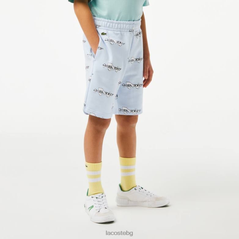 деца Lacoste светло синьо къси панталони от щампована органична памучна фланела облекло XTV623102