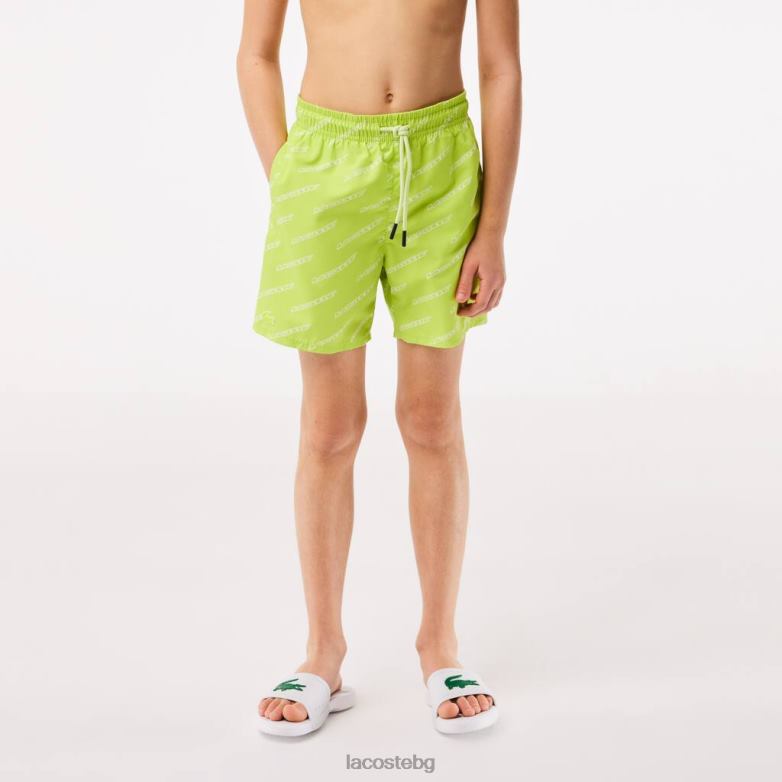 деца Lacoste жълто/бяло щамповани рециклирани полиестерни бански гащи облекло XTV623109