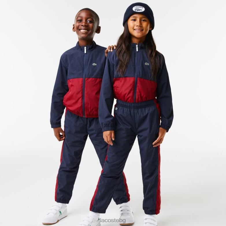 деца Lacoste морско синьо/бордо панталони с контрастна лента облекло XTV623225