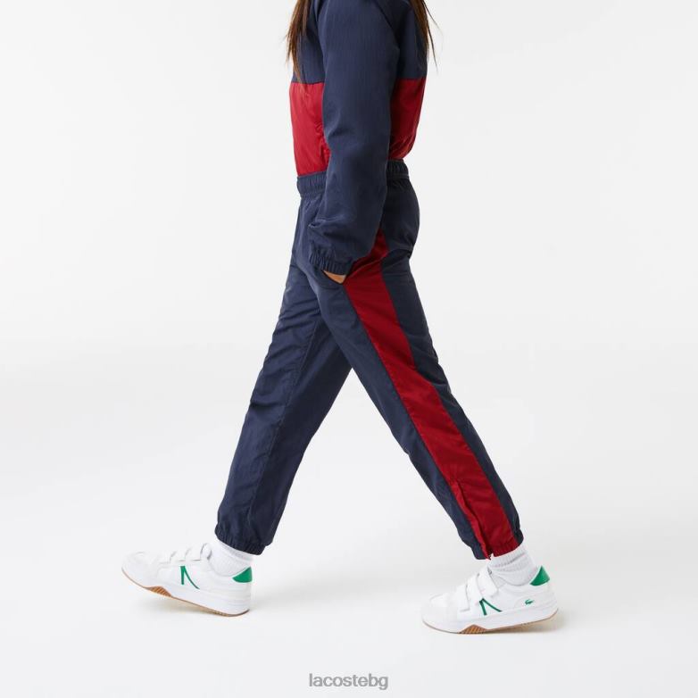 деца Lacoste морско синьо/бордо панталони с контрастна лента облекло XTV623225