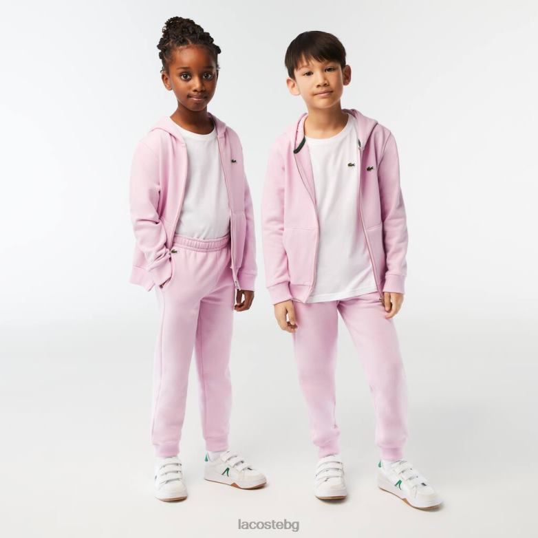 деца Lacoste розово панталони colorblock облекло XTV623212