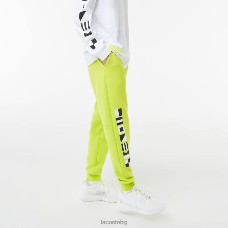мъже Lacoste жълто панталони със светлоотразителен принт облекло XTV621046
