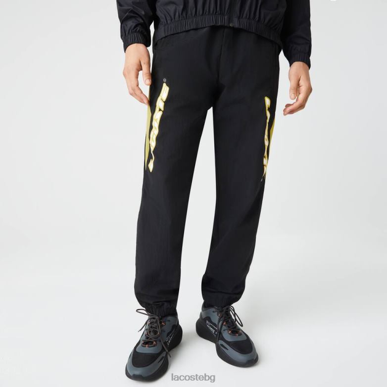 мъже Lacoste черно/жълто наследствени спортни панталони с цветни блокове облекло XTV621110