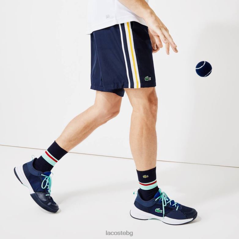 мъже Lacoste тъмносиньо/жълто/бяло спортни контрастни ленти леки шорти облекло XTV621363