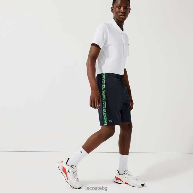 мъже Lacoste морско синьо/зелено шорти със спортни маркови странични ленти облекло XTV621506
